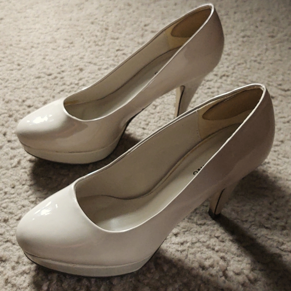Call it Spring nude platform heels